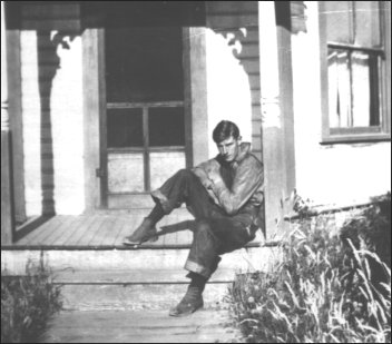 (Harry on the porch of the gazebo house)