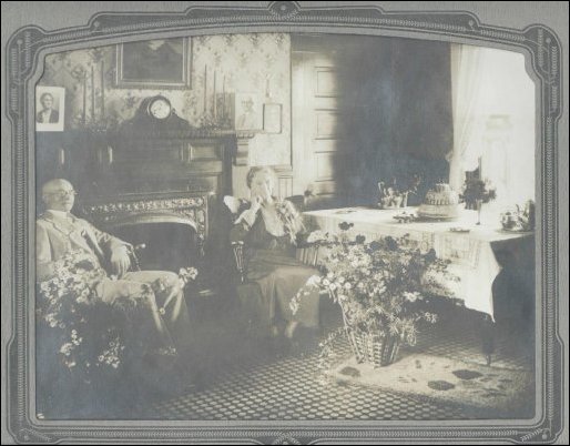 (Henry and Katherine in their parlor)